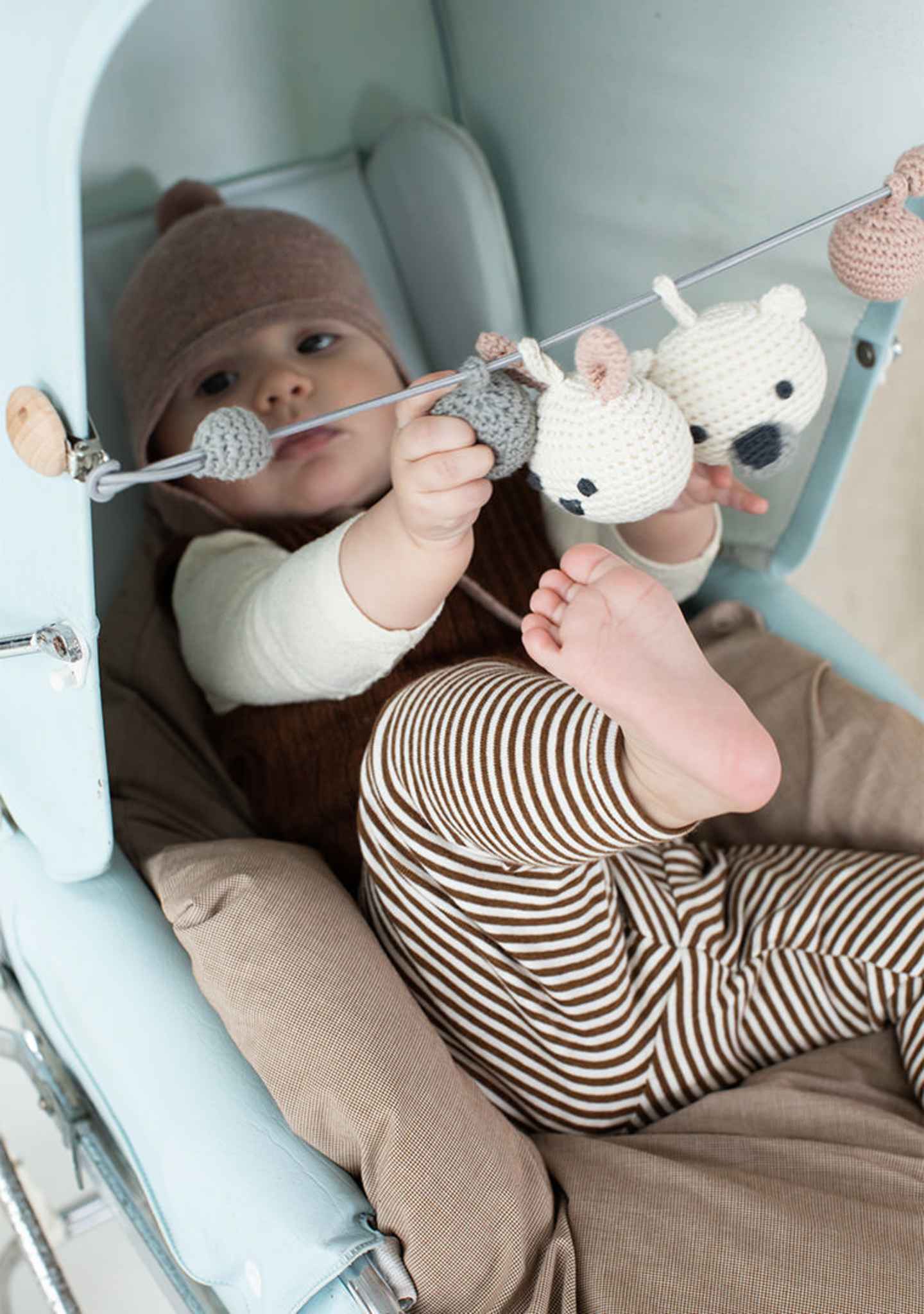 3---Hugo-white-Pram-rattle